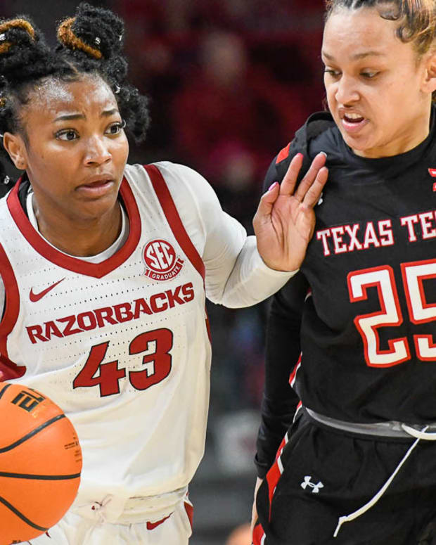 Razorbacks' Makayla Daniels drives against Texas Tech in the WNIT on Friday night at Bud Walton Arena.